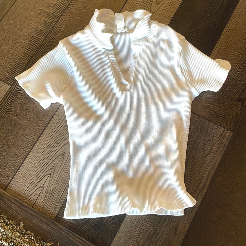This is a shirt with a b coller and very comfortable material